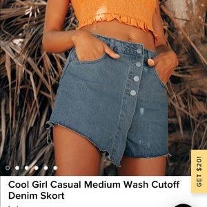 Medium wash denim cut off skort